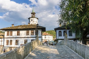 Old houses and clock tower in the town of Tryavna